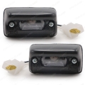 ไฟส่องป้าย ไฟส่องป้ายทะเบียนรถยนต์ เล็ก 2 ชิ้น สีดำ,ใส Toyota Corolla KE70 E70 KE75 TE70 TE71 TE72 ปี 1979-1987